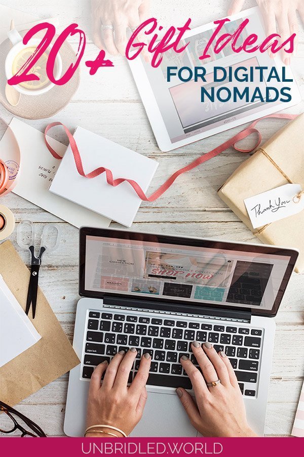 Laptop with crafting stuff and the text overlay: 20+ Gift Ideas for Digital Nomads